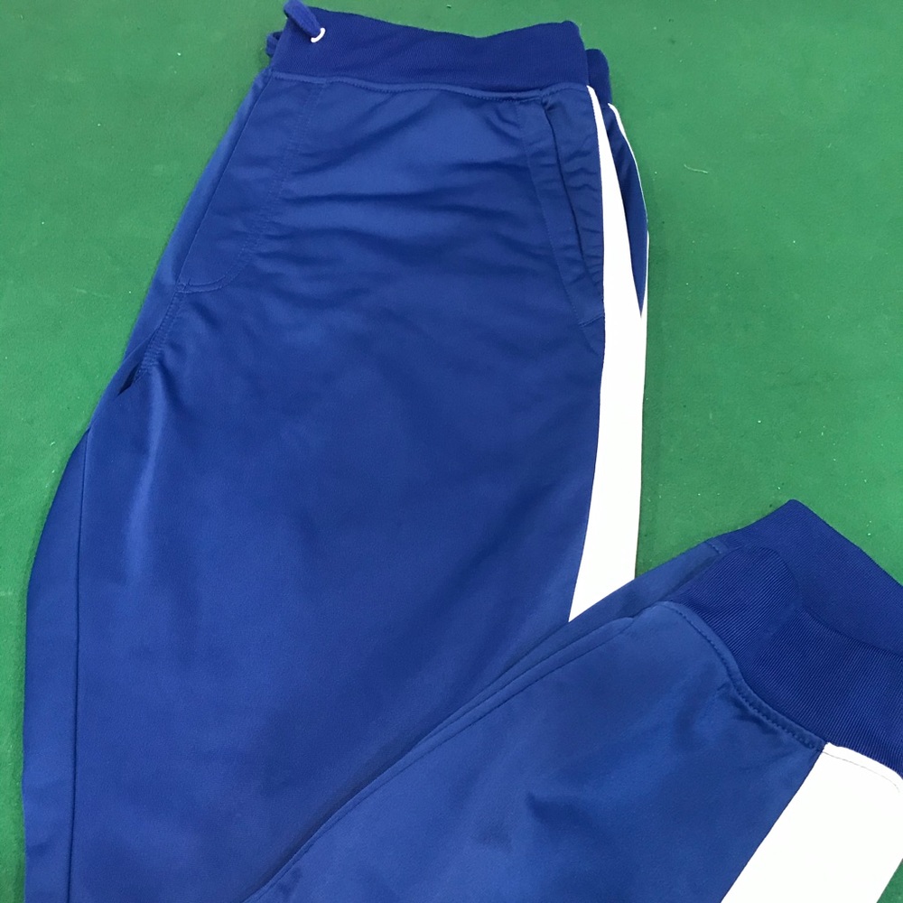 Blue empyre tracks with white stripe on the side.